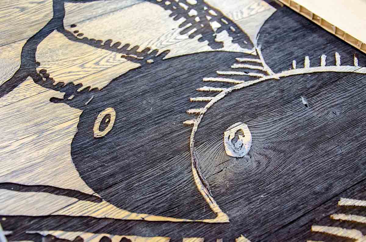 burning wood by laser to create organic images