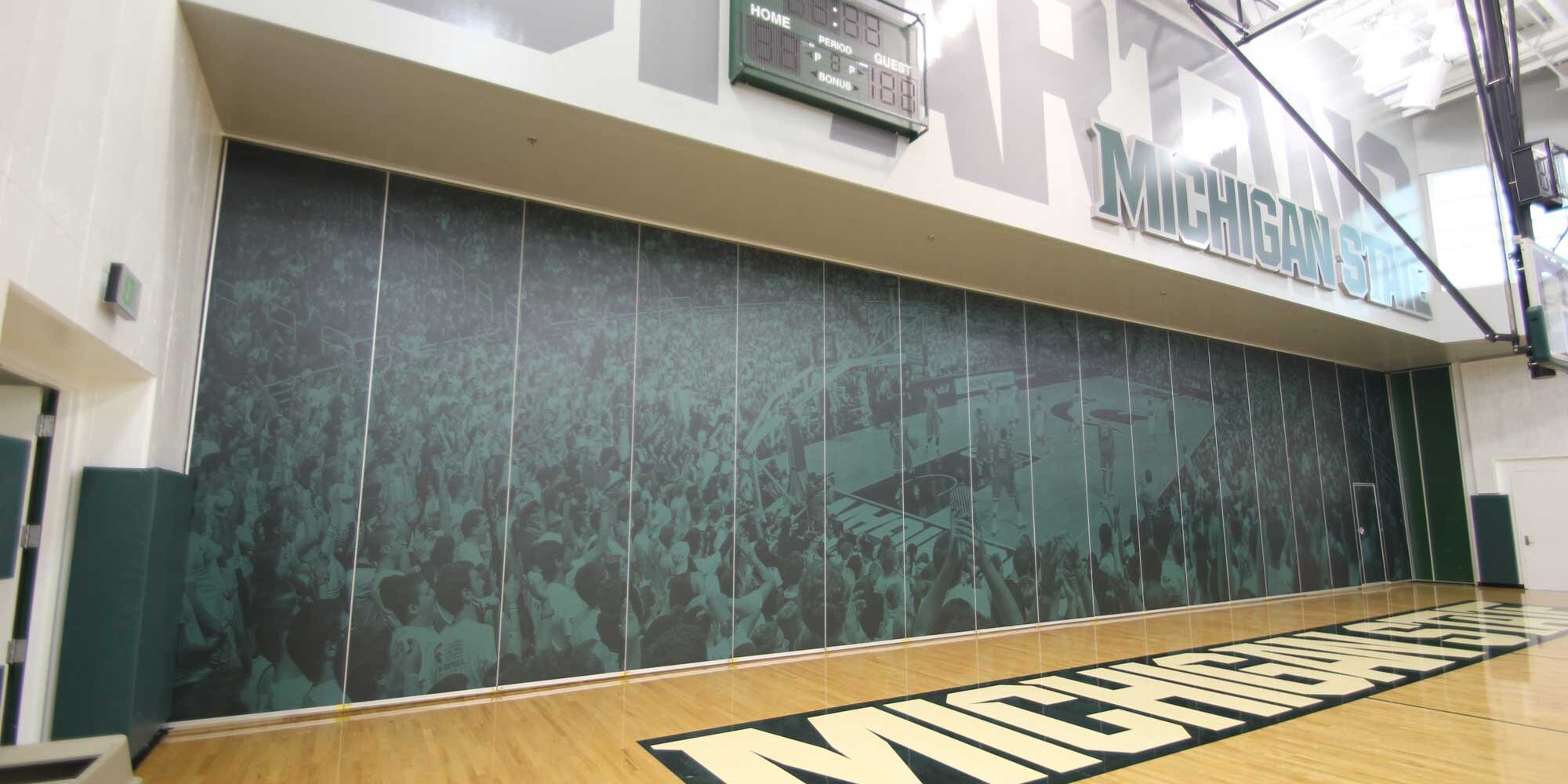 wall graphic displaying basketball game at Michigan State University