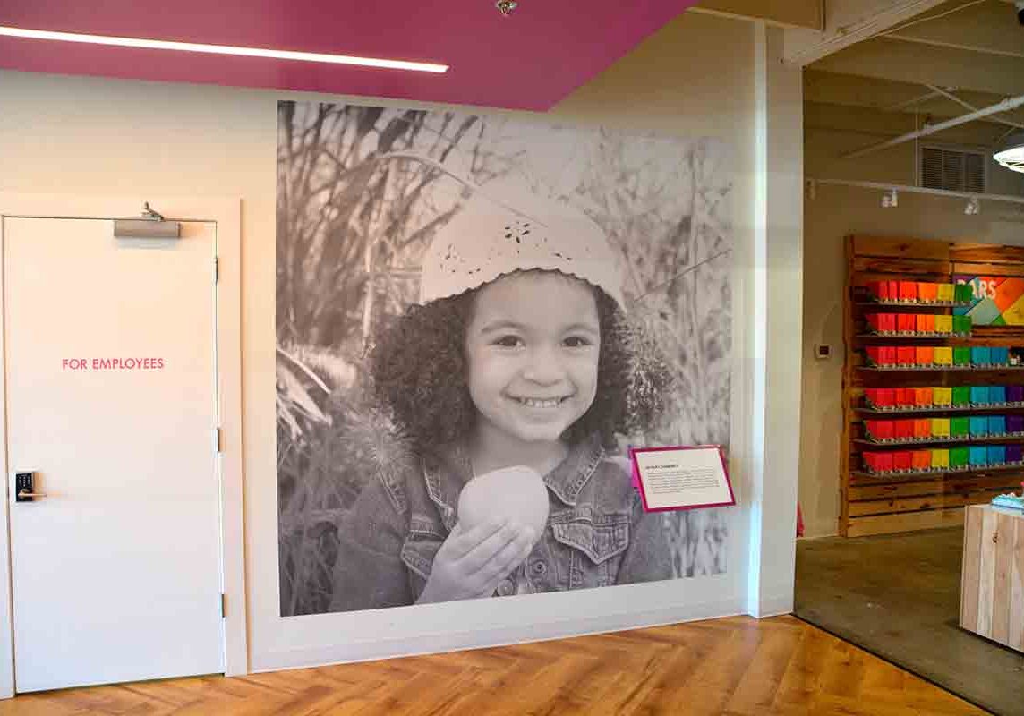 mural made of wallcovering depicts a young girl